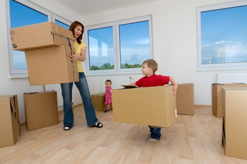 Professional movers handling furniture with care