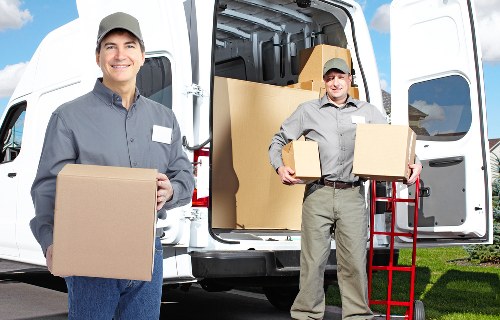 House removalists packing furniture and boxes